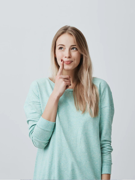  Girl wearing a mint color sweater image