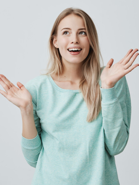  Girl wearing a mint color sweater image