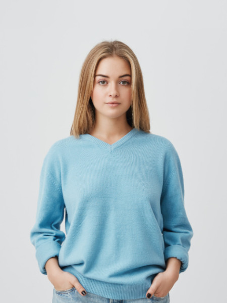  Girl wearing a blue color sweater image