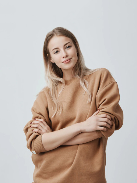  Girl wearing a mint color sweater image