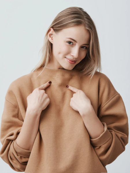  Girl wearing a mint color sweater image