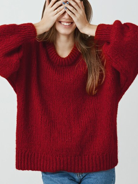  Girl wearing a mint color sweater image