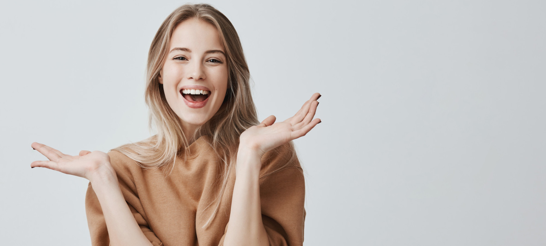 Woman wearing a mint color sweater